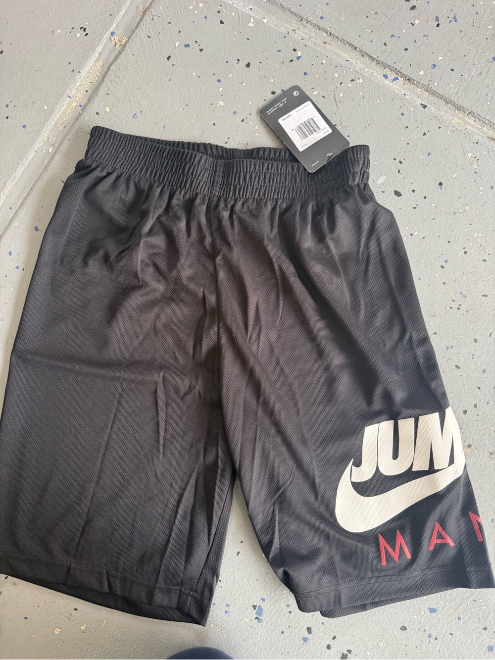 Jordan Men’s Black Athletic Shorts with White & Red Jumpman Graphic